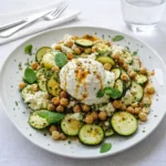 Grilled Zucchini Chickpea Salad with Burrata and Chili Oil on a platter