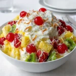 Creamy Hawaiian Cheesecake Salad with fresh tropical fruit and toasted coconut.